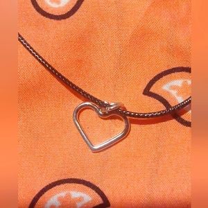 Black cord necklace with heart charm